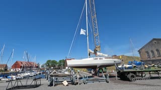 Cleaning boat with pressure washer