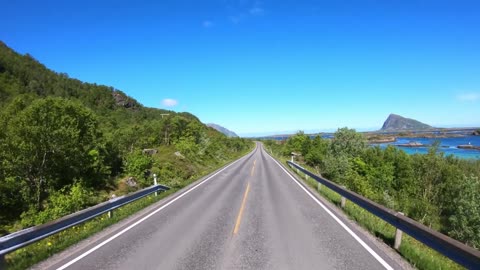 vehicle point of view driving a car on a road in norway