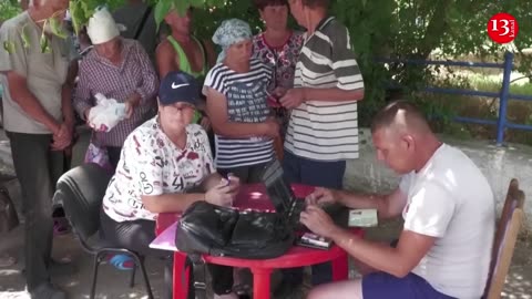 One month after Ukraine dam breach, villagers in Russian-controlled areas live in destroyed homes