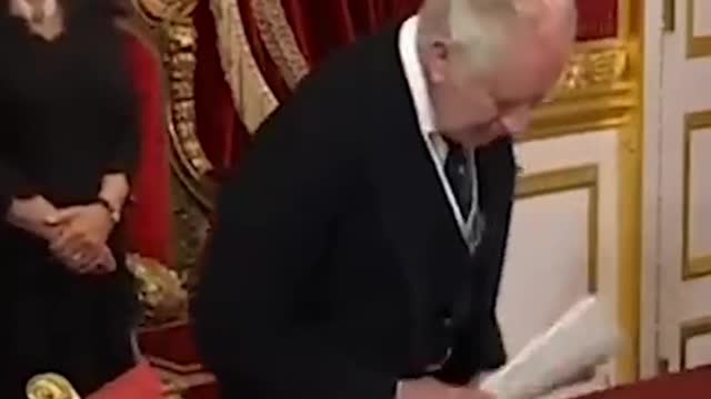 King Charles gestures for staff to remove pens twice