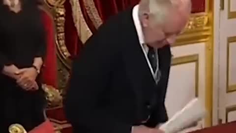 King Charles gestures for staff to remove pens twice