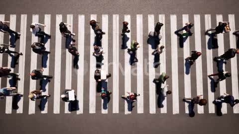 Large Crowd of People Cross the Road