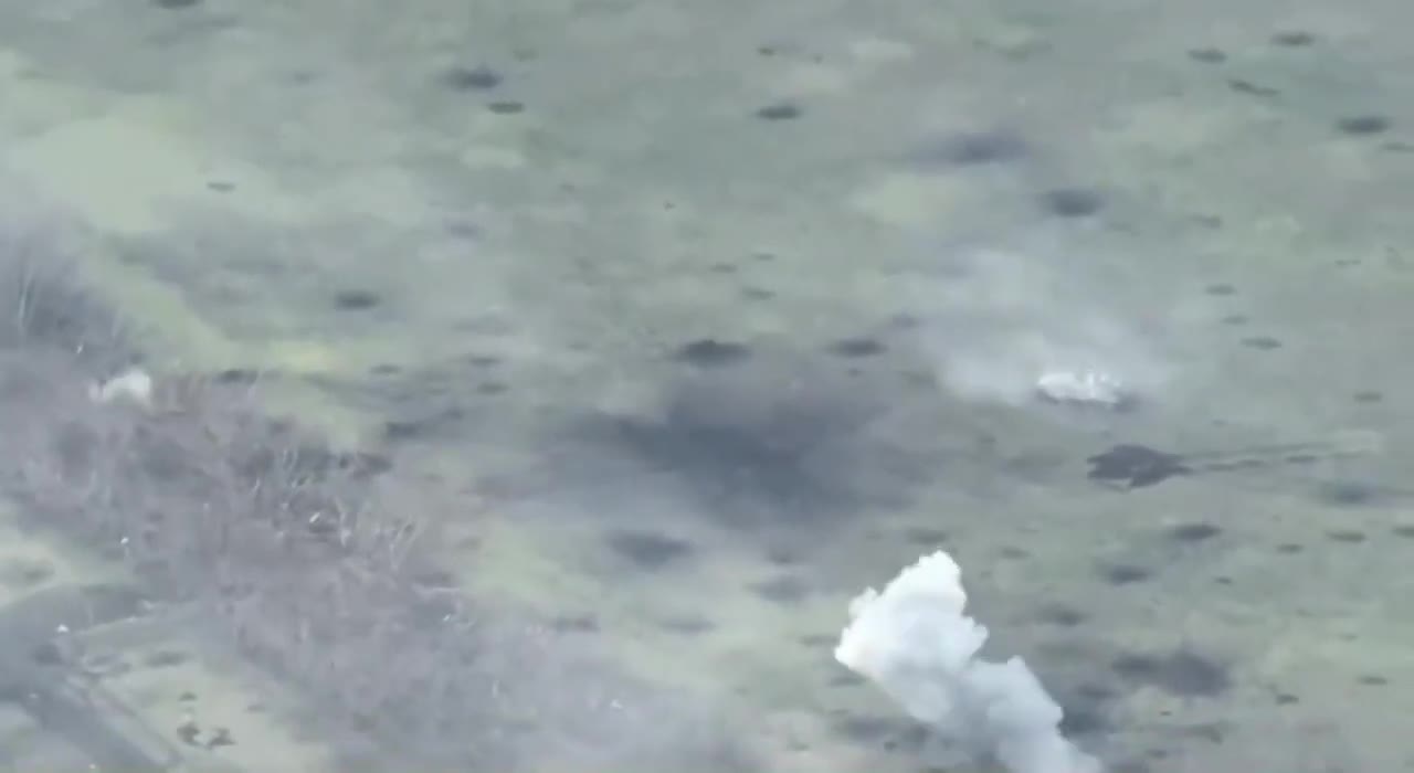 Drone footage of Russian tank hit by a Javelin missile in Donetsk Oblast