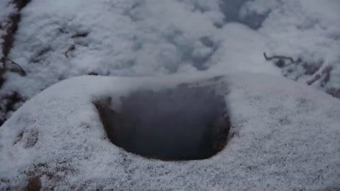 Four excavated shelter.Building underground bunker.Earth hut. primitive technology.Clay stone oven-1