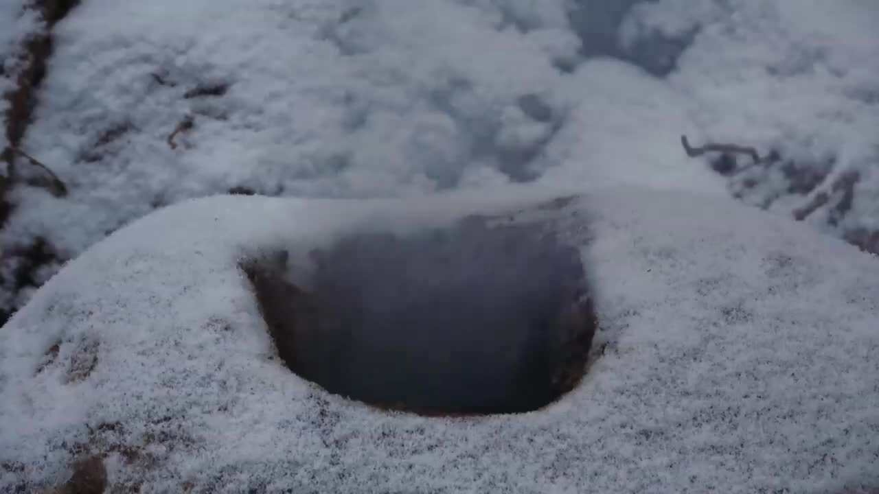 Four excavated shelter.Building underground bunker.Earth hut. primitive technology.Clay stone oven-1