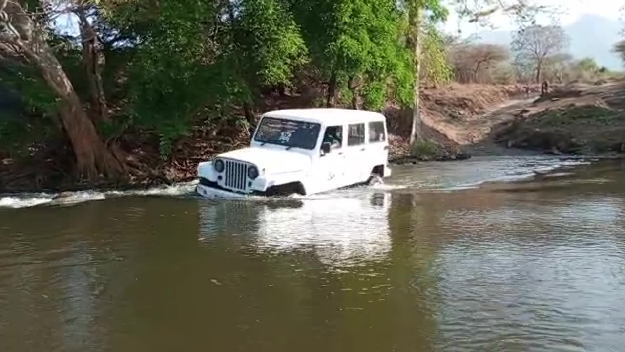 Car Riding In A River