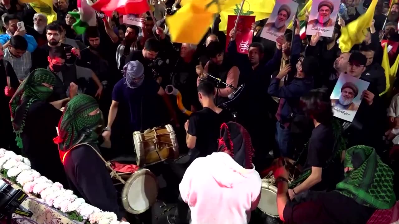 Iranians celebrate in Tehran after missile strikes on Israel