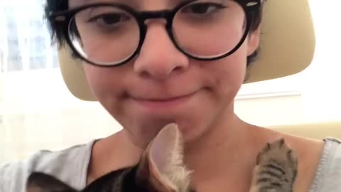 Cat gives owner kisses <3