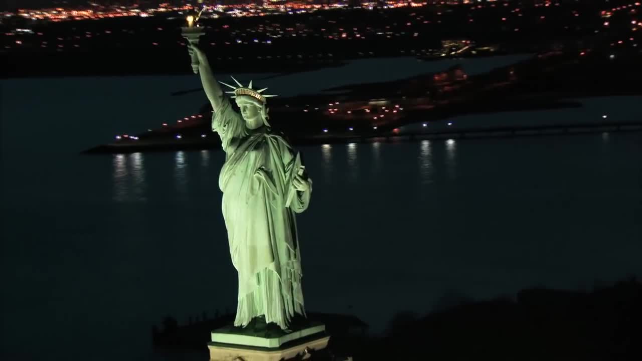 Statue of Liberty in New York City, American Freedom, Aerial Night Video of Liberty Island