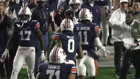 Cadillac Williams reacts to Auburn's touchdown pass against Texas A&M