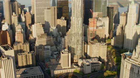 An aerial view of a downtown city is displayed