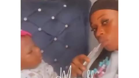 Mom Blows Weed Smoke In Baby's Face