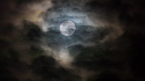 Moon And Clouds In The Night Sky