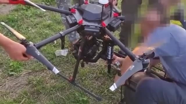 Closer look at the drone Ukrainians are testing with a mounted gun under It