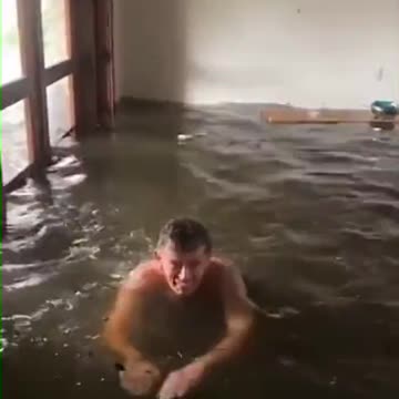 Florida Resident SWIMMING in the Surge in Their House