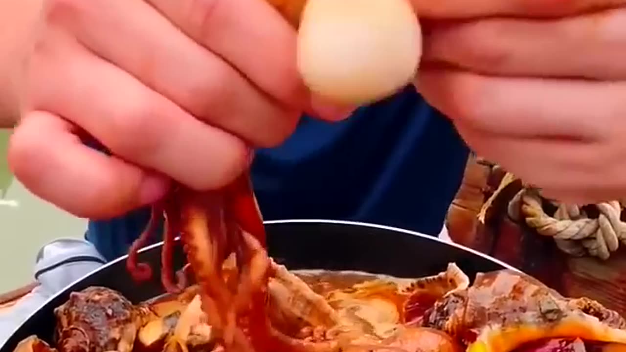 Chinese fisherman cooking and Eating fresh seafood