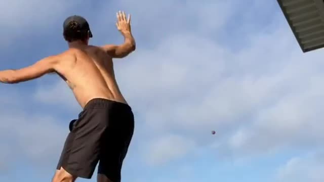 Guy Over Slackline Sharpens Balancing Skills While Practicing Tricks With Friends