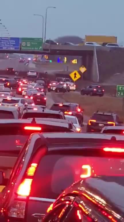 Pro-Palestine Hamas sympathizers block traffic on route to the airport in Chicago at Christmas