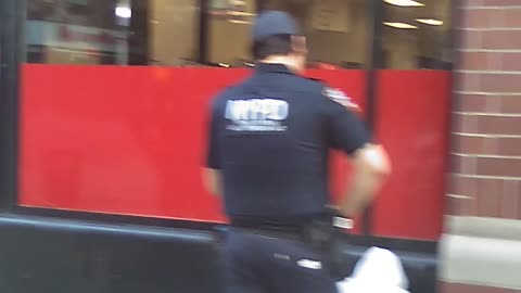 NYPD detain a suspected caucasian women suspected of theft..