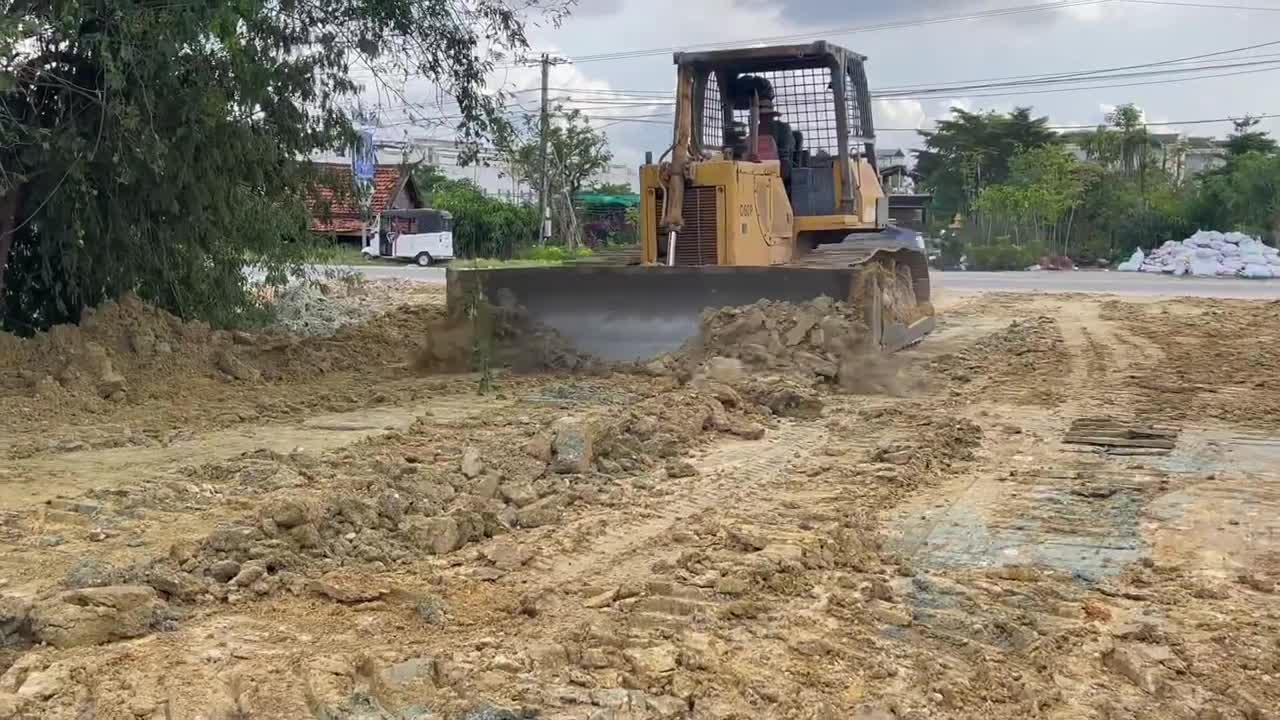 The best new project land filling up nice showing great talented skill driver Bulldozer moving dirt