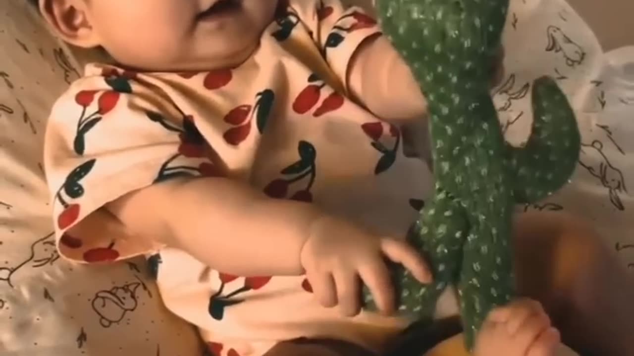 baby funny crying because of dancing cactus toy