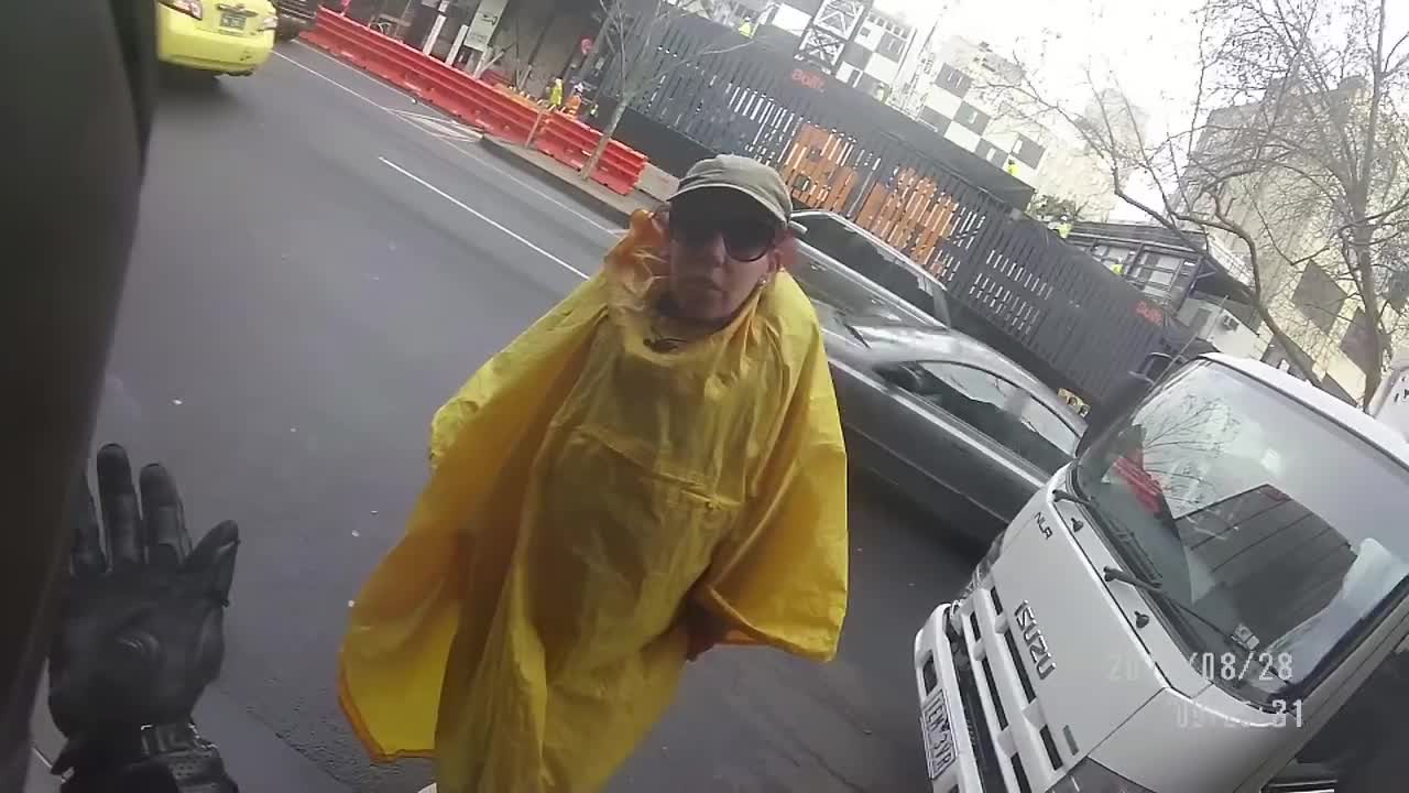 Crazy Raincoat Lady VS Mean Looking Biker