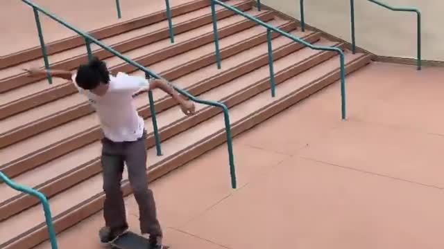 skateboard down stairs