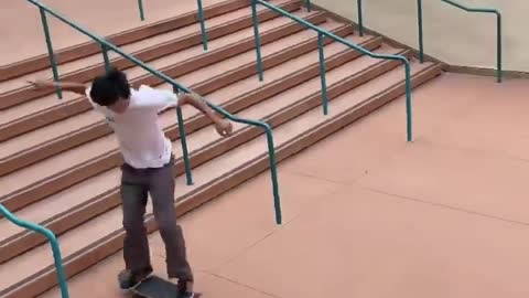 skateboard down stairs