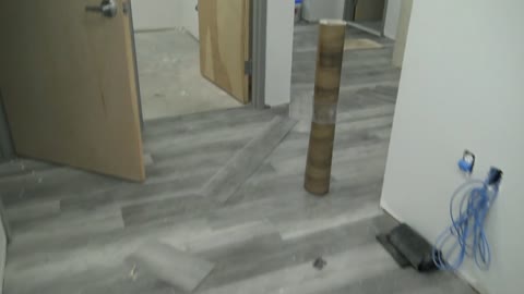 Installation of 3615 ft of MSI , 20 mil vinyl plank, style Prescot