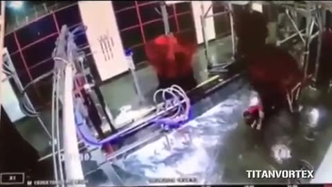 Car wash worker gets hose and himself caught on the spinning part of machine