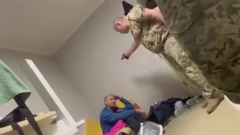 Ukrainian Soldiers torture one of their own for fleeing the battlefield