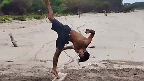 Stunt video on beach double side flip