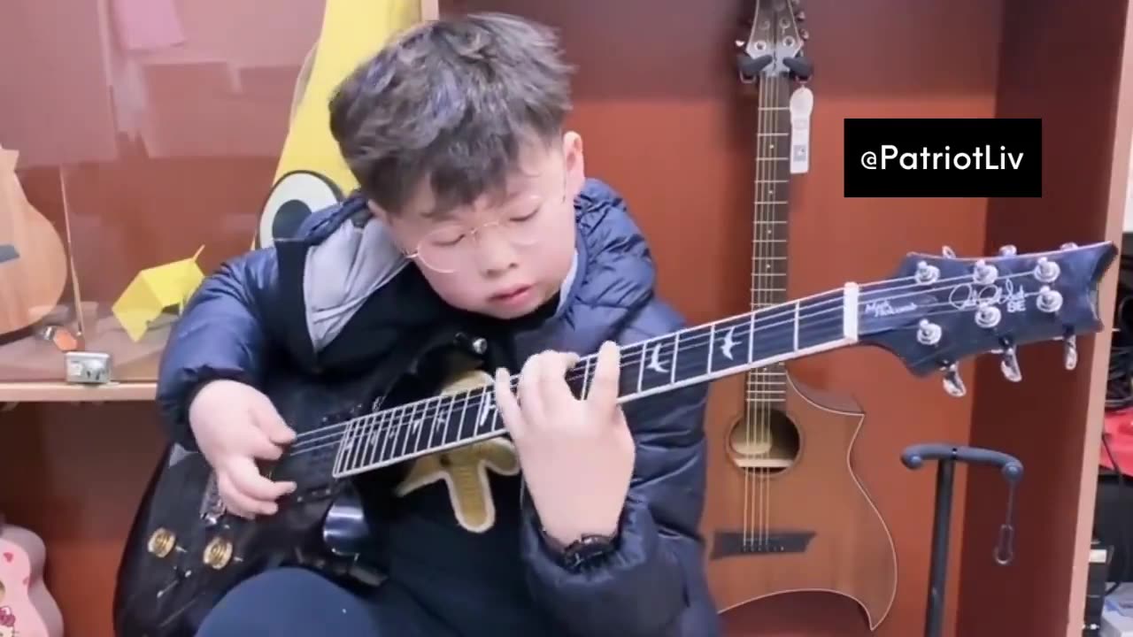 Kid Guitar Savant