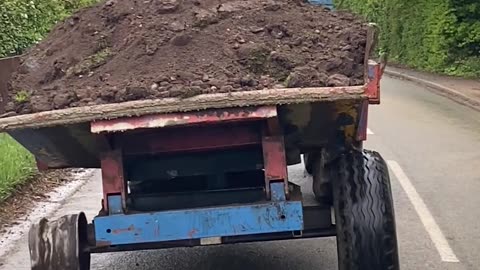 Tractor Limps Along With Missing Tire