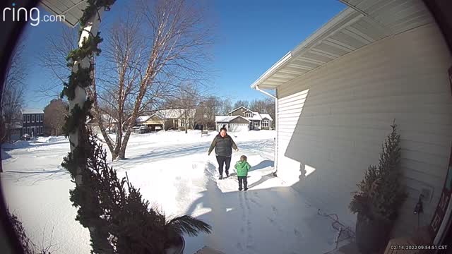 Kid Cracks up When Mom Slips on Ice