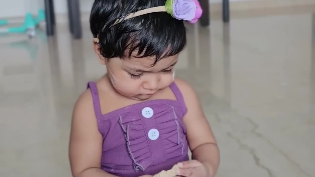 Baby cooks food for Mom