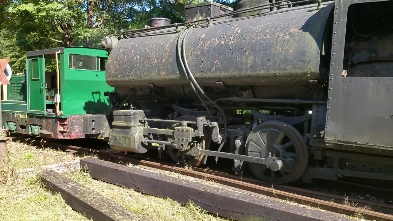 OUR 1923 PLYMOUTH LOCO AT WORK THIS SUMMER TOWING AN INTERESTING STEAM ENGINE