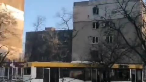 Ukraine War - Burnt out bus barricade.
