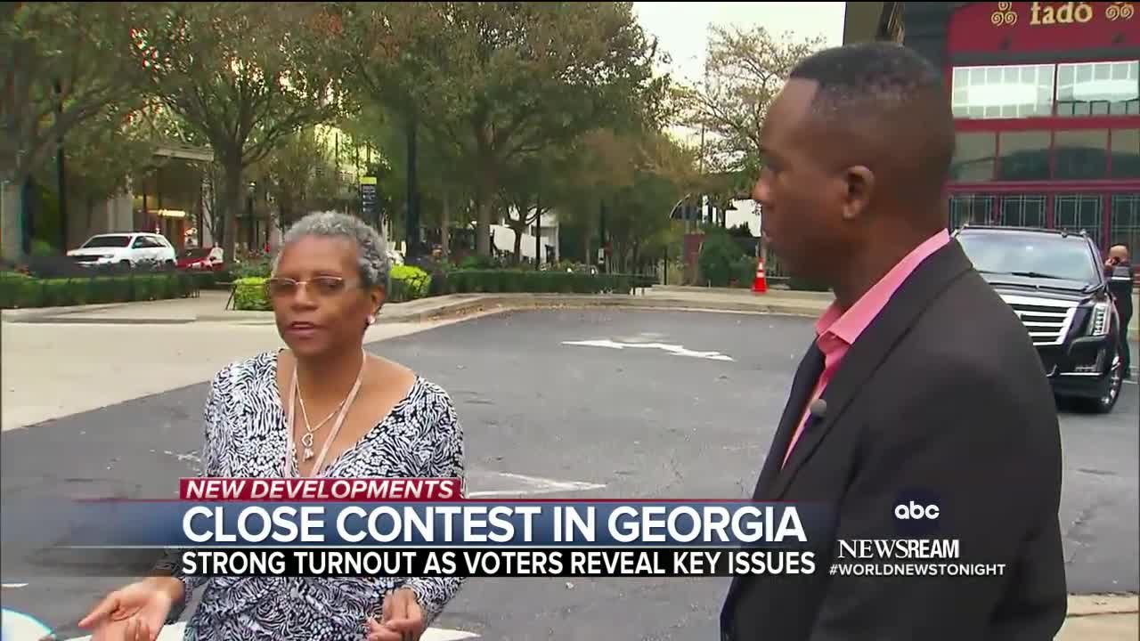 Georgians cast their ballots, set a midterm record for early voting