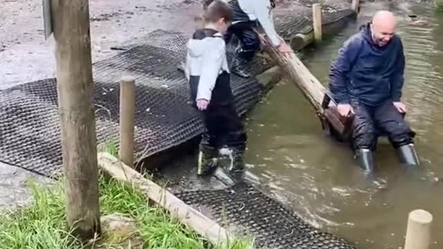 Boy falls in pond