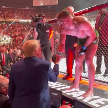 UFC fighter jumps over cage to greet Trump after TKO win