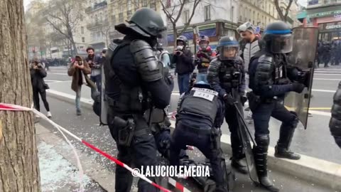 The Moment a Cop gets knocked out by a projectile in France