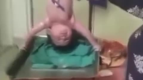 New baby holding watch it
