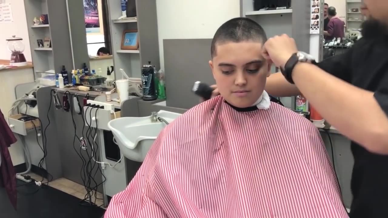 Girl Buzzes Off All Her Hair In a Barbershop