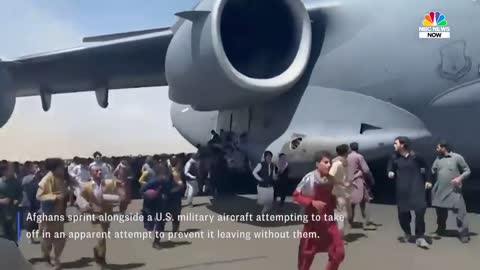 Watch_ Afghans Run Alongside U.S. Military Plane At Kabul Airport