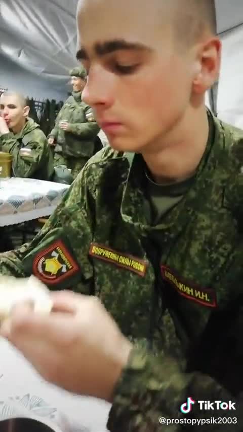 Russian soldiers from 14th Separate Engineering Brigade eating