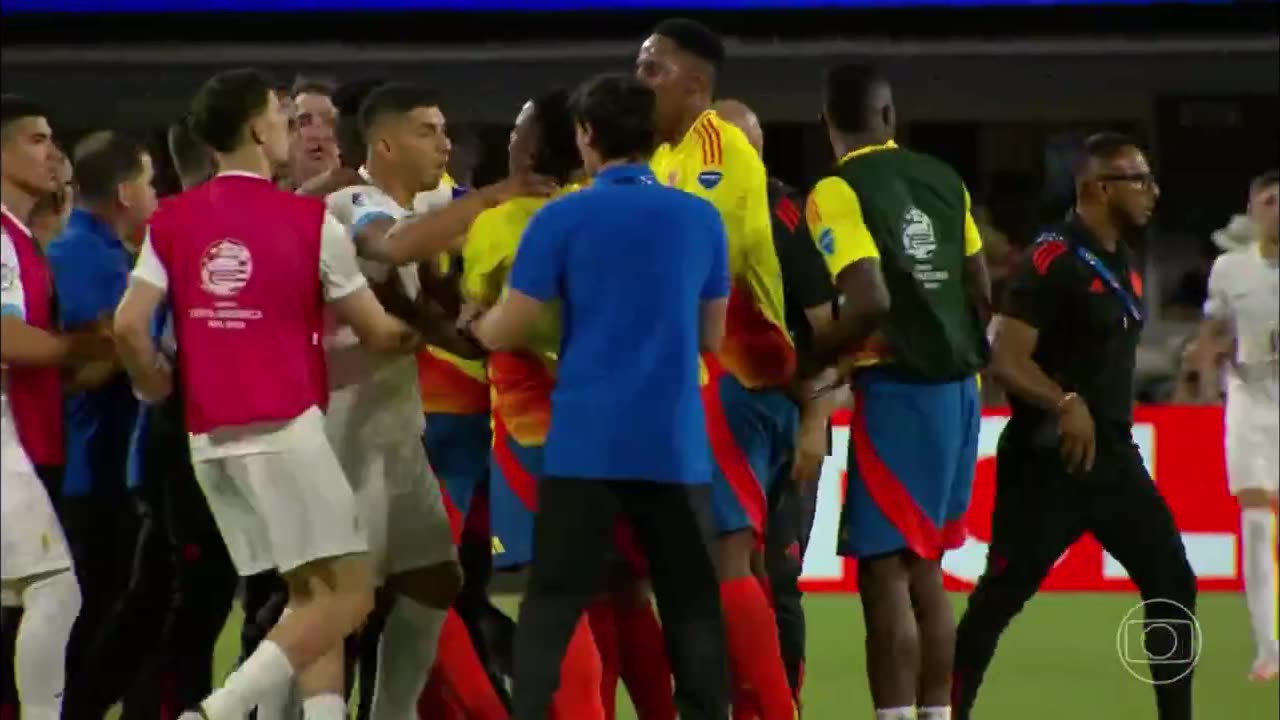 Luis Suárez tries to bite Colombian player Miguel Borja