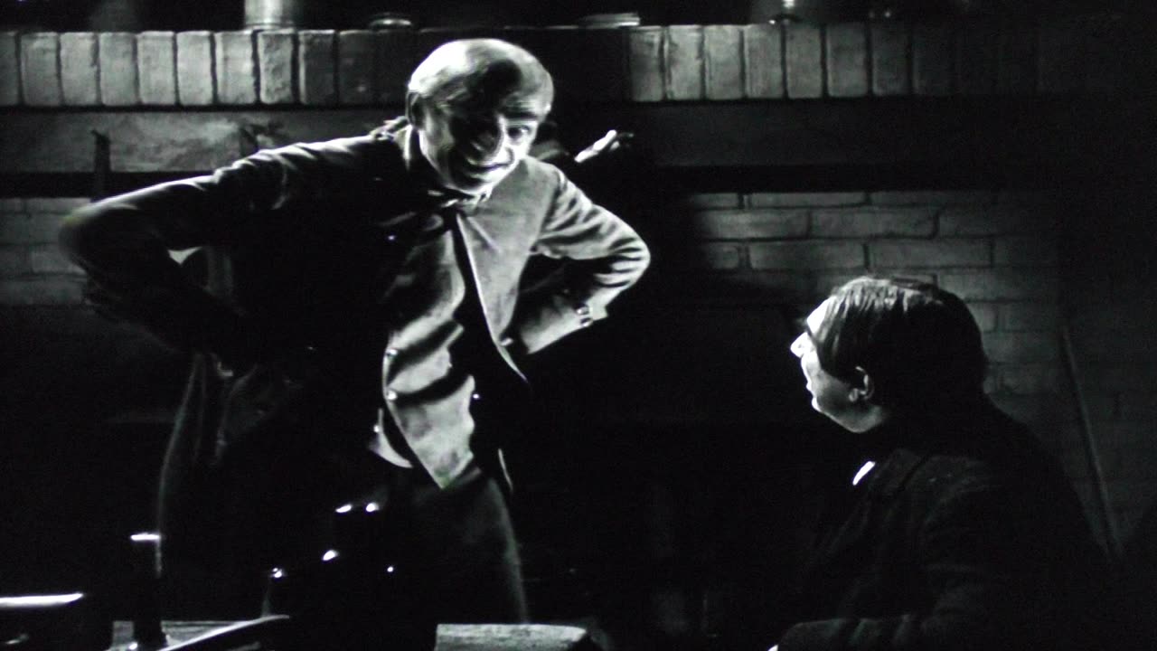 Boris Karloff murders Bela Lugosi in "The Body Snatcher"