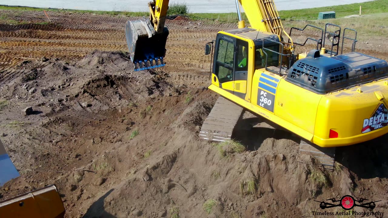 Heavy Equipment Moving Dirt 4K Drone Footage