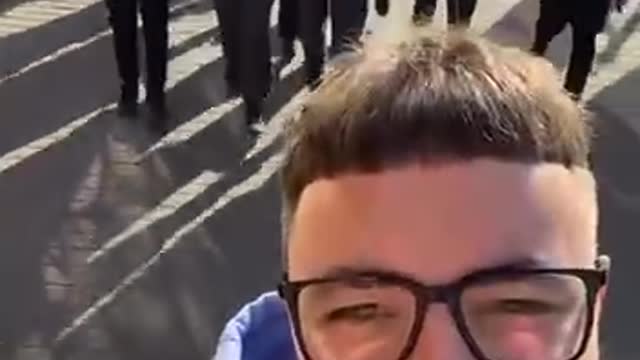 Ukrainian children singing a Nazi WW2 song in the middle of the street.